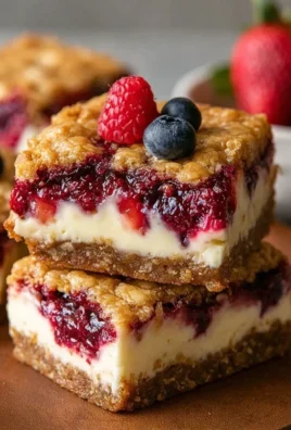 Berry Oatmeal Cheesecake Bars